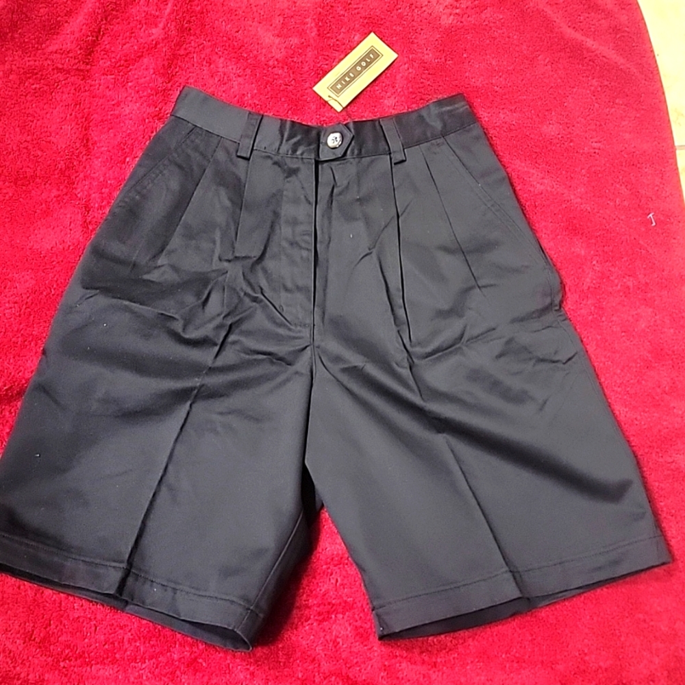 NWT Nike Golf shorts. Color Black. Size 6